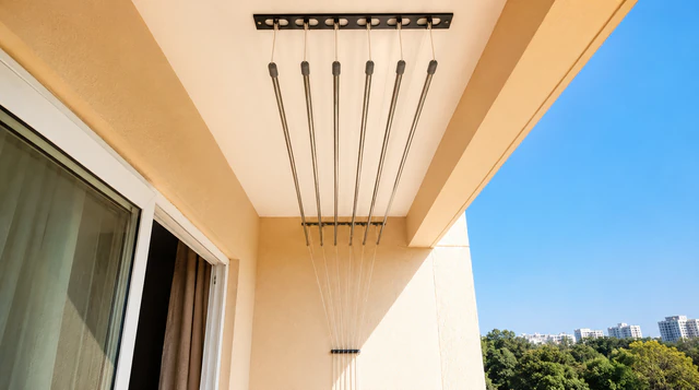Ceiling-mounted cloth hanger installed on a balcony in Hyderabad
