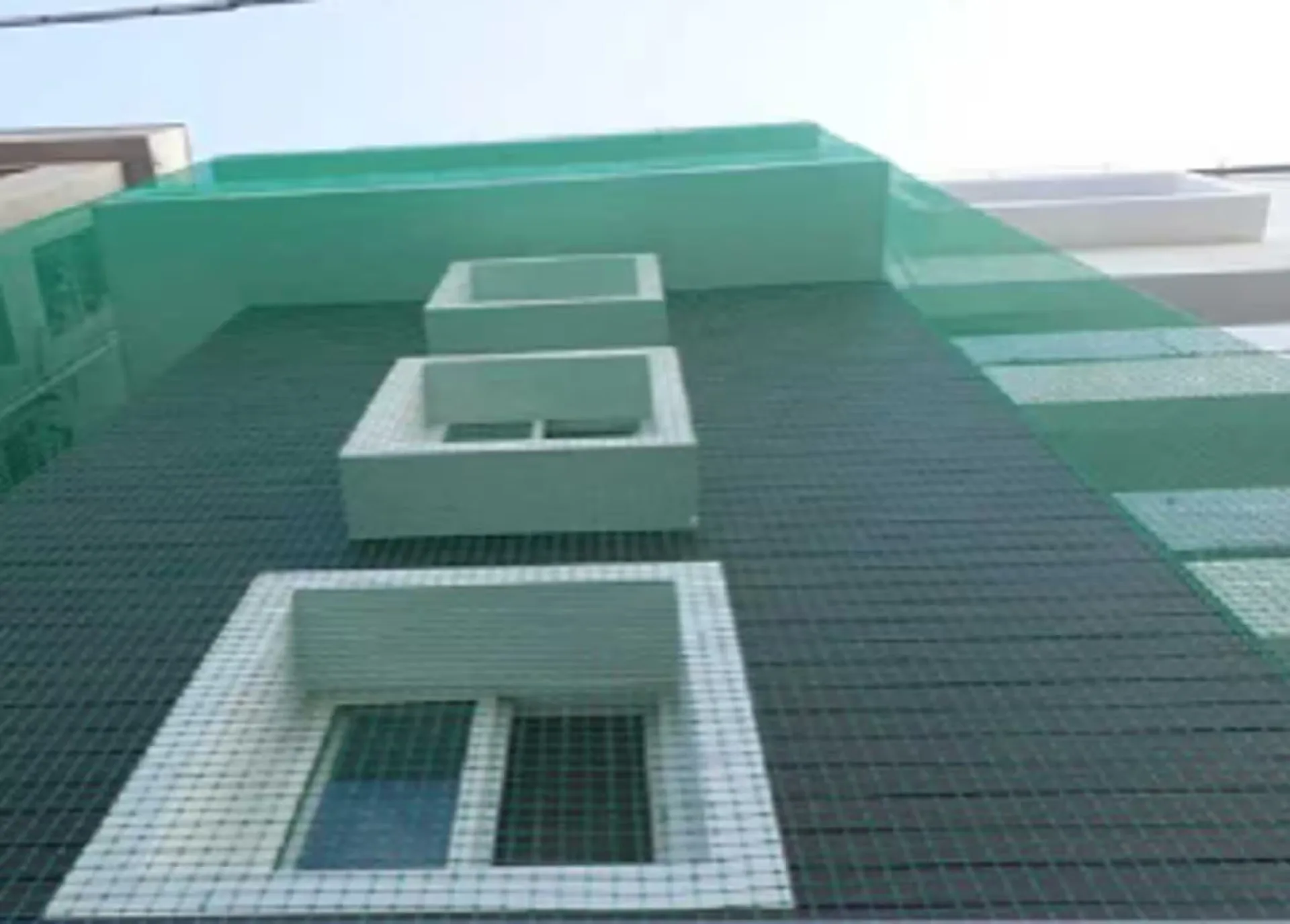 Duct area netting installed on a building in Hyderabad